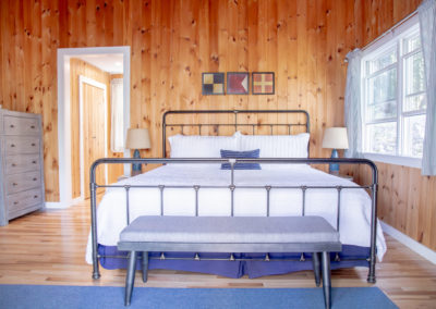 Cabin bedroom king bed.
