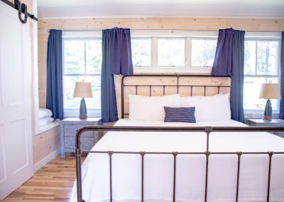 Cabin bedroom king bed.