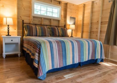Windjammer King Bed Wooded Cabin
