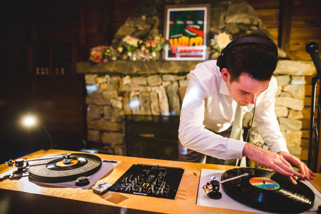 DJ at wedding spinning records