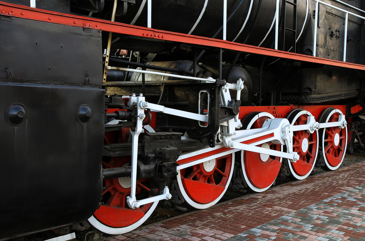 Steam train wheels.