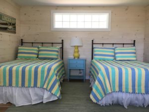 Lodge bedroom with two queen beds.
