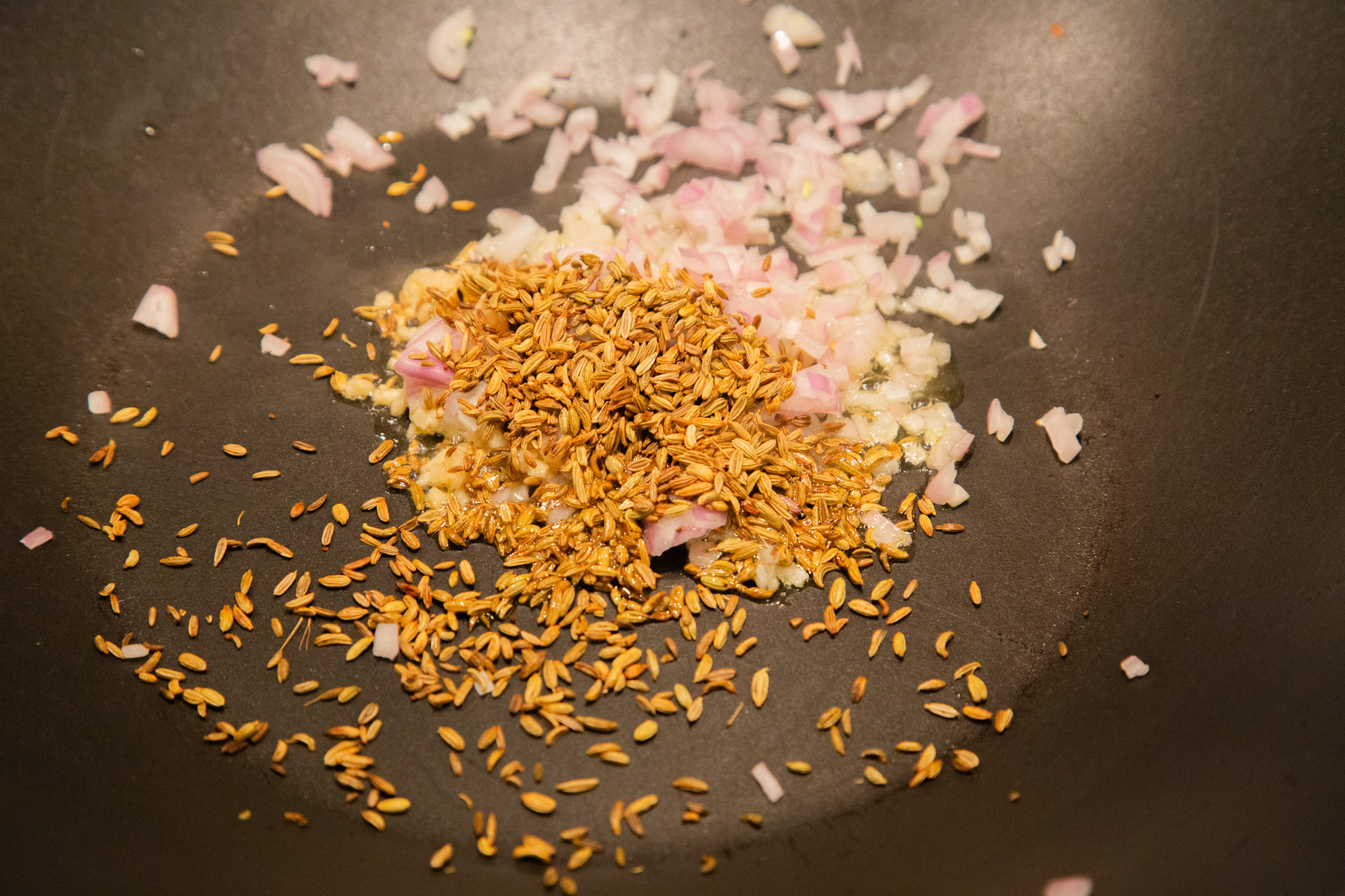 Fennel seed with garlic and shallots.