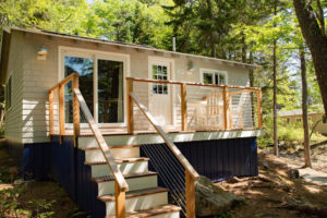One story lodging with deck.