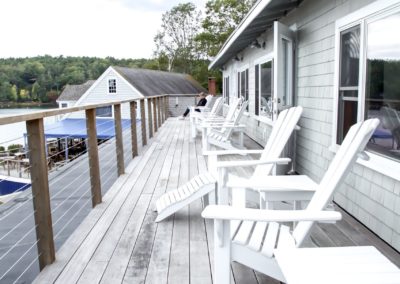Waterfront Jr Suite - patio with Adirondack chairs.