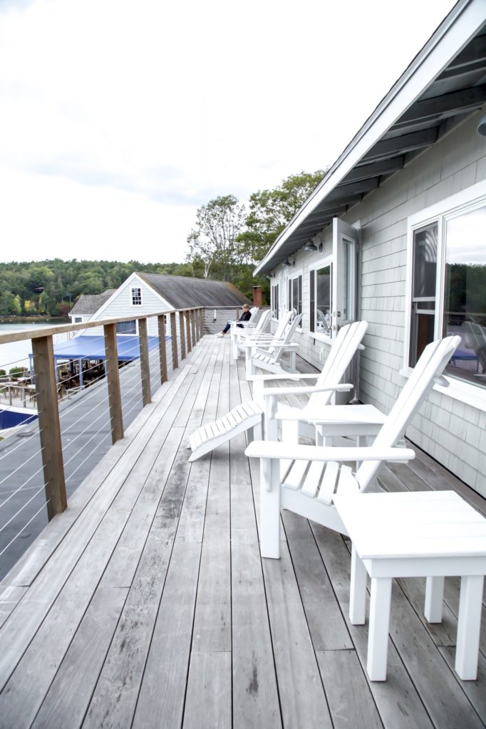 Waterfront Jr Suite - patio with Adirondack chairs.