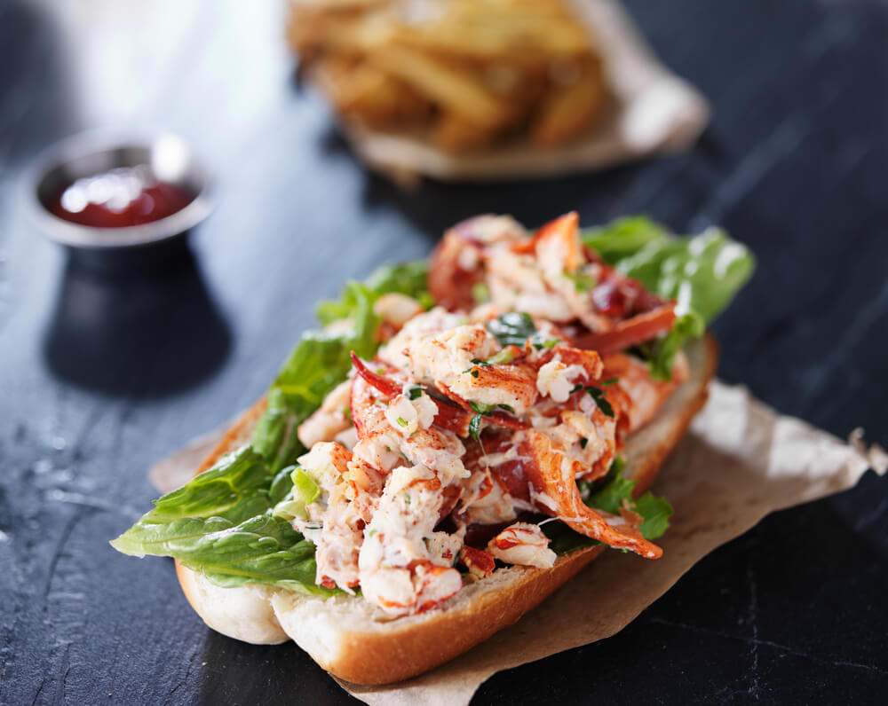 A photo of a lobster roll from one of the top Boothbay Harbor restaurants.