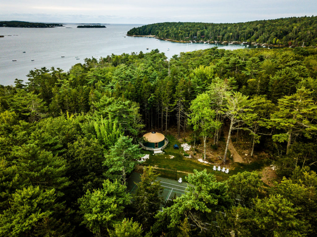 Yurt and tennis courts on the up-top at Linekin Bay Resort.