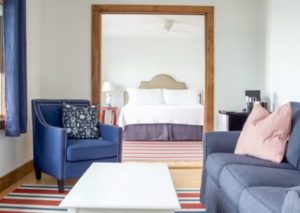 Look over photos from your whale watching adventure in a luxurious room at a Boothbay Harbor resort.