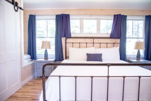 A cozy room at a Maine resort to relax in after driving from Portland to Boothbay Harbor.
