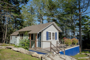 the exterior of a cottage rental to stay at on a Maine fall vacation.