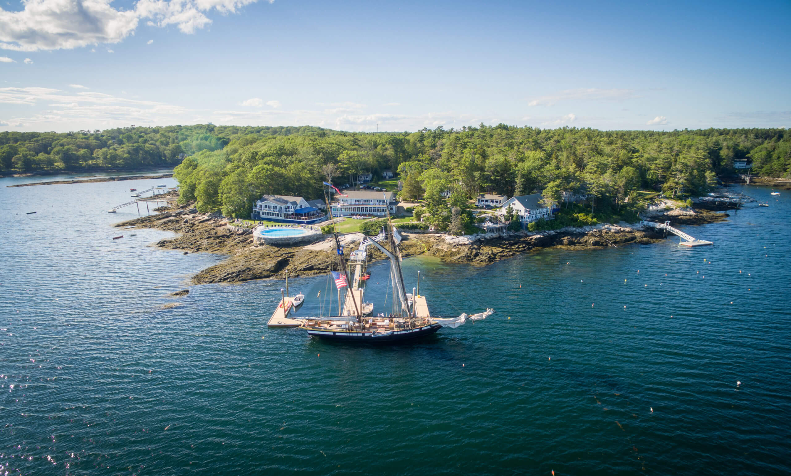 An aerial view of a resort filled with Boothbay Harbor rentals.